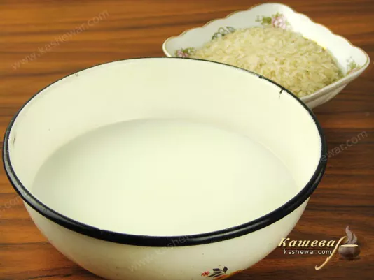 Mix water with milk, boil and pour rice