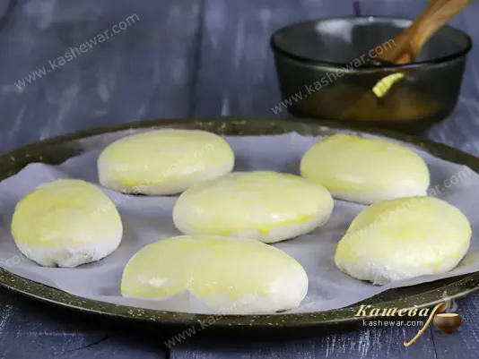 Pies smeared with egg yolk