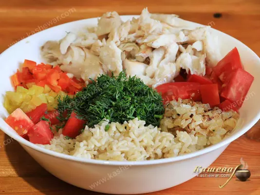 Fish salad with rice and vegetables