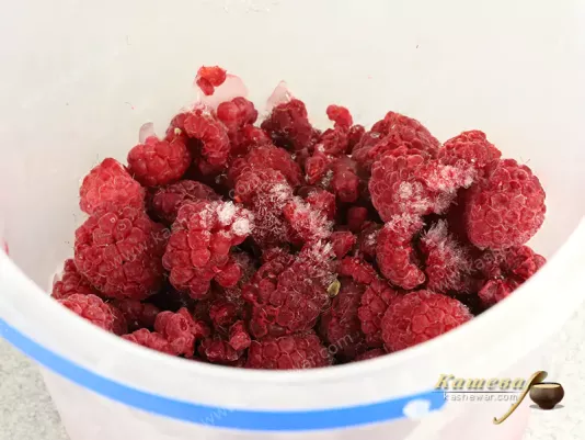 Frozen raspberries in boxes