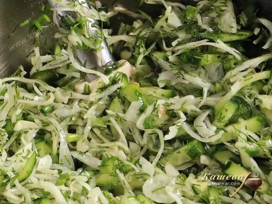 Cabbage, cucumber and greens salad