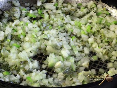 Finely chopped onions in a pan