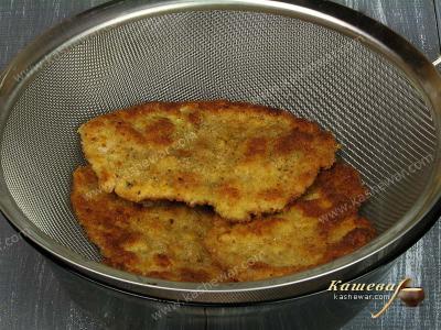 Fried pork cutlet in a strainer