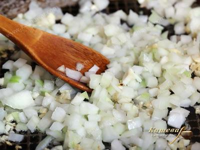 Finely chopped onion in a skillet