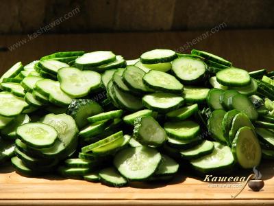 Cutting cucumbers for Nezhinsky salad