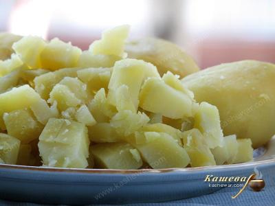Cooking and cutting potatoes for okroshka