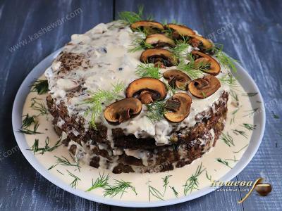 Liver cake with mushroom sauce