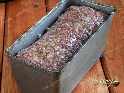 Minced meat roll in a baking dish