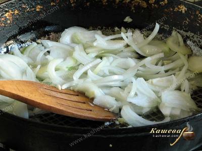 Chopped onions in a frying pan