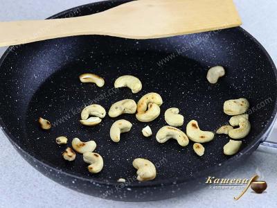 Cashews fried in a pan