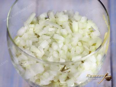 Finely chopped onion in a glass