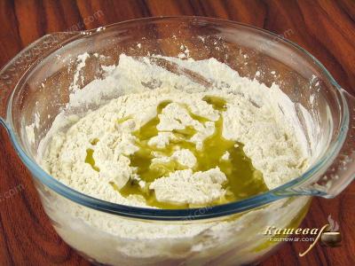 Add olive oil to pizza dough